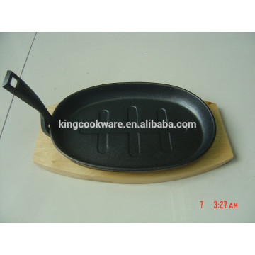 cast iron steak baking sizzling pan with wood base